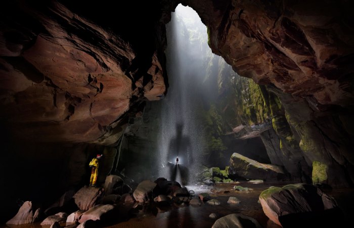 Exploring underwater caves stock